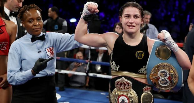 Katie Taylor celebrates her win over Victoria Bustos  after their WBA & IBF world lightweight title unification bout in New York City. Photograph:  Elsa/Getty Images