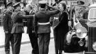 Taoiseach Charles Haughey and President Mary Robinson greeted by Lieutenant General James Parker, Chief of Staff, on arrival outside the GPO in 1991. Photograph: Jack McManus