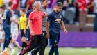 Jose Mourinho leaves the pitch with Andreas Pereira following Manchester United’s 4-1 defeat to Liverpool. Photo: Jason Miller/Getty Images