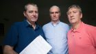 Abuse survivor John Allen (left) with his application to the ECJ, fellow survivor Christopher Rainbow (right) and campaigner Mark Vincent Healy. Photograph: Dave Meehan