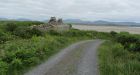 Inishbiggle Island:  the fields  are empty and silent, while the roadside is sprinkled with abandoned cottages