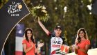 Dan Martin celebrates after he received the  prize for being the Tour de France’s most combative  rider after the  last stage in Paris on Sunday. Photograph: Getty Images