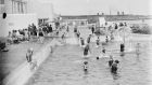 People bathe at the public baths at Dún Laoghaire, circa 1925. Photograph: Dillon Family/National Library of Ireland Flickr Commons