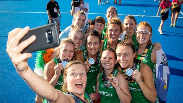 Ireland players celebrate with their silver medals after the World Cup final against the Netherlands. Photograph: Morgan Treacy/Inpho