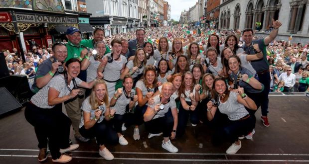 The Ireland team show off their silver medals at the homecoming event on Dame Street in Dublin. Photograph: Tommy Dickson/Inpho