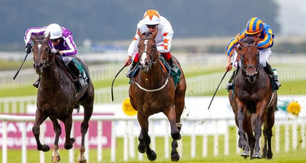 Advertise (centre) ridden by Frankie Dettori on the way to winning the Keeneland Phoenix Stakes at the Curragh. Photograph:  Bryan Keane/Inpho
