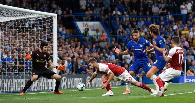 Chelsea’s Marcos Alonso scores their third goal in the Premier League game against Arsenal at Stamford Bridge. Photograph: Toby Melville/Reuters 