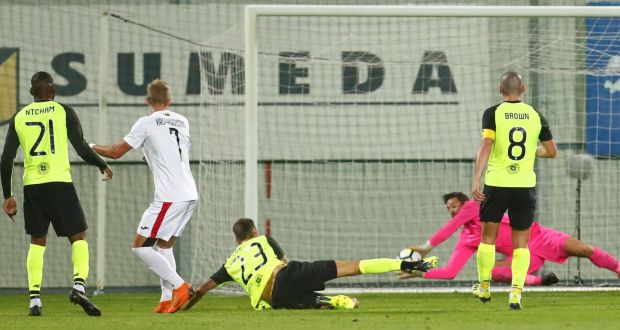  FK Suduva’s Julius Kasparavicius shoots at goal against Celtic. Photograph: Ints Kalnins/Reuters
