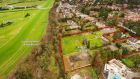 A newly-registered company has lodged a planning application to build 14 houses and 38 apartments at the rear of three properties backing on to Leopardstown racecourse.