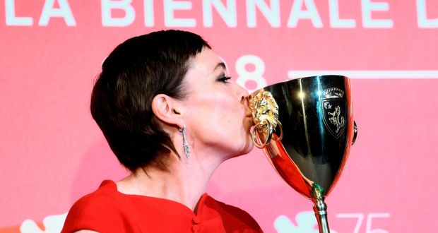 Actor Olivia Colman celebrates with the Coppa Volpi for Best Actress in ‘The Favourite’ at the Venice Film Festival. Photograph: Filippo Monteforte/AFP/Getty Images