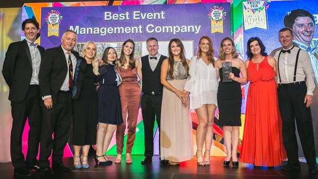 Declan Maxwell, Restaurant Manager, Luna Restaurant, presents the Best Small Event Management Company award to Jamie Roche, John Grubb & Tommie Ryan, EveryEvent.