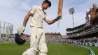 England’s Alastair Cook acknowledges the thunderous prolonged ovation as he returns to the pavillion after being dismissed for 147 in his last Test match against India at The Kia Oval in London. Photograph: Mike Hewitt/Getty Images