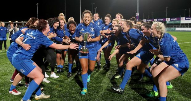 Leinster captain  Sene Naoupu celebrates with the her team-mates after winning the interprovincial championship at Donnybrook on Saturday night. Photograph: Bryan Keane/Inpho