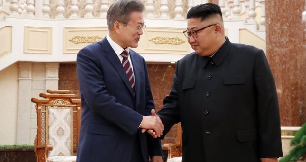South Korean president Moon Jae-in shakes hands  with North Korean leader Kim Jong-un before their summit at the Workers’ Party of Korea headquarters in Pyongyang on Tuesday. Photograph:  Pyeongyang Press Corps/AFP/Getty Images