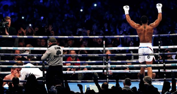 Anthony Joshua celebrates his latest win at Wembley. Photograph: Adrian Dennis/AFP/Getty