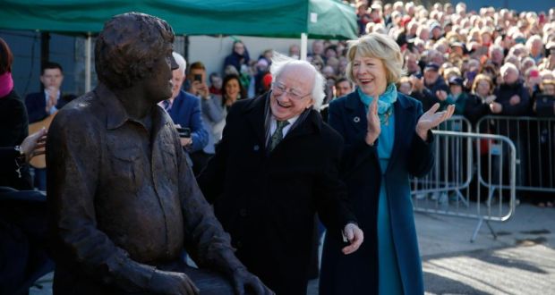 President Michael D Higgins and Sabina admire the Big Tom statue in Castleblaney, Co Monaghan. Photograph: Nick Bradshaw