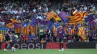  Barcelona fans with their Catalan flags at Camp Nou. Photograph: Albert Gea/Reuters