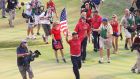 Anthony Kim of the USA celebrates with an American flag after the USA 16 1/2 - 11 1/2 at the 2008 Ryder Cup in Kentucky. Photo: Ross Kinnaird/Getty Images