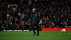 Manchester United manager José Mourinho leaves the Old Trafford pitch after their League Cup defeat to Derby County. Photo: Paul Ellis/Getty Images