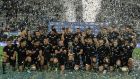  New Zealand pose with the trophy after winning the Rugby Championship in Buenos Aires. Photograph: Getty Images