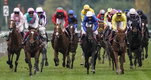 Frankie Dettori and Enable (L) take the Arc ahead of Sea Of Class (second R). Photograph: Alan Crowhurst/Getty