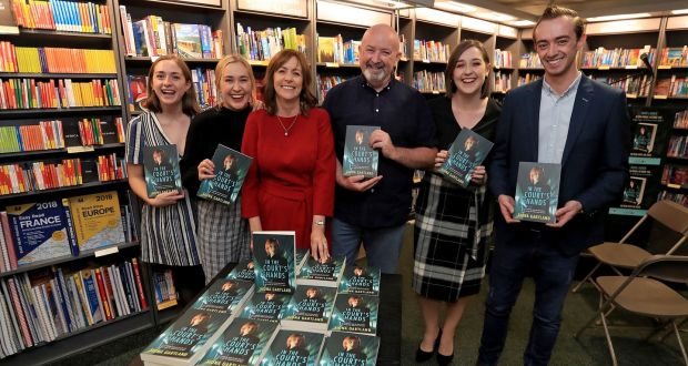  Fiona Gartland with husband Paul and children Rose, Katie, Jeni and Paul jnr at the launch of her book, In the Court’s Hands,  in Hodges and Figgis on Dawson Street, Dublin on Friday.  Photograph: Donall Farmer for The Irish Times