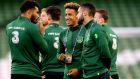 Callum Robinson (centre) talks to Cyrus Christie (left) and Derrick Williams as the Ireland players walk the pitch after arriving at the Aviva stadium ahead of Nations League game against Wales. Photograph: Ryan Byrne/Inpho