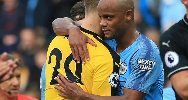 Burnley’s   goalkeeper Joe Hart   and Manchester City’s captain Vincent Kompany embrace at the end of City’s 5-0 victory at  the Etihad Stadium. Photograph: Lindsey Parnaby/AFP