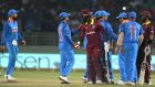 Indian cricket captain Virat Kohli (left) and team-mates shake hands with the West Indies batsmen after the second one-day international ended in a tie in Visakhapatnam. Photograph: Noah Seelam/AFP/Getty Images
