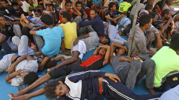 Illegal migrants in the Ganzour shelter in the Libyan capital of Tripoli. The UNHCR has updated its policy to say Libya is no longer a safe country to return people to. Photograph: Mahmud Turkia/Getty Images