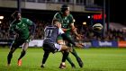 Ultan Dillane of Connacht gets his pass away as Keelan Giles of Ospreys closes in for the tackle in the Guinness Pro 14 game at  Morganstone Brewery Field in  Bridgend. Photograph: Alex Davidson/Inpho