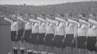 The German team line up and raise their right hands during the national anthems ahead of the 5-2 loss to Ireland in Dalymount Park in 1936. Photo: Pathé News screenshot