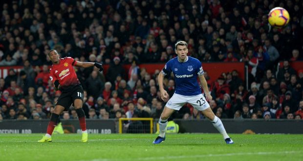 Seamus Coleman looks on as Anthony Martial scores Manchester United’s second against Everton. Photograph: Peter Powell/Reuters