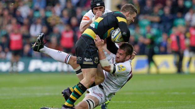 Leicester Tigers’ Dominic Ryan tackles Northampton Saints’ George North during an Aviva Premiership match in 2017. The match was the beginning of the end of Ryan’s career. Photograph: Henry Browne/Getty Images