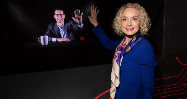 Vodafone Ireland chief executive Anne O’Leary high fives interim technology director Max Gasparroni during what is believed to be the first Irish international holographic call. Photograph: Naoise Culhane