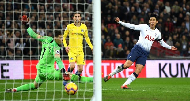 Heung-Min Son scores  Tottenham Hotspur’s  third goal during the Premier League match against  Chelsea  at Wembley Stadium. Photograph:  David Ramos/Getty Images