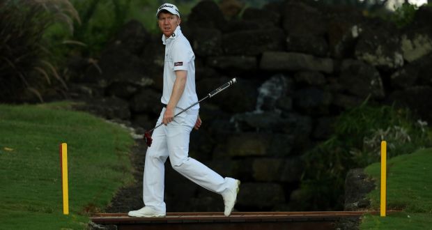 Gavin Moynihan of Ireland crosses the bridge to the ninth green during the second round of the AfrAsia Bank Mauritius Open at Four Seasons Golf Club in Poste de Flacq, Mauritius. Photo: Warren Little/Getty Images