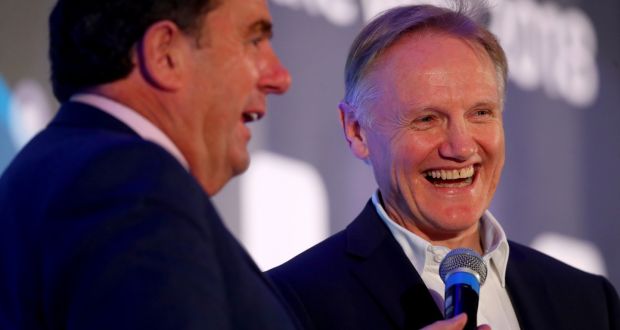 Des Cahill talks to Ireland rugby coach Joe Schmidt after he was named Philips Sports Manager of the Year at an awards ceremony at the InterContinental Hotel in Dublin. Photograph: Tommy Dickson/Inpho
