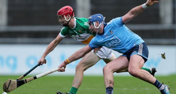 Dublin’s John Hetherton and Niall Houlihan of Offaly in action during the Walsh Cup match at Parnell Park. Photograph: Laszlo Geczo/Inpho