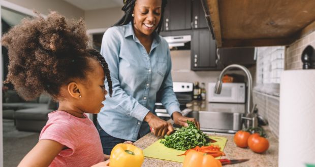 Take time to involve your children in preparing a meal once a week. Photograph: iStock