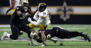  New Orleans Saints’ Sheldon Rankins (left) moves in to tackle JuJu Smith-Schuster of the Pittsburgh Steelers during the first half at the  Superdome. Photograph: Chris Graythen/Getty Images