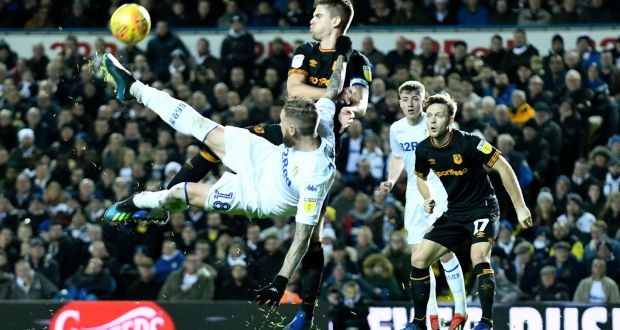 Pontus Jansson of Leeds United attempts an overhead kick under pressure from Markus Henriksen of Hull CIty during the Sky Bet Championship match at Elland Road. Photo: George Wood/Getty Images