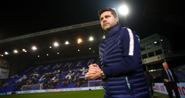 Tottenham Hotspur manager  Mauricio Pochettino inspects the pitch prior to the FA Cup third-round match against  Tranmere Rovers  at Prenton Park. Photograph: Clive Brunskill/Getty Images