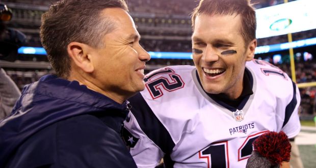 Tom Brady  with Alex Guerrero who is  his  personal body coach and godfather to one of his children. Photograph: Elsa/Getty Images