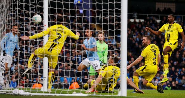 Manchester City’s Gabriel Jesus scores their second goal in the Carabao Cup semi-final first leg against Burton Albion. Photo: Phil Noble/PA Wire