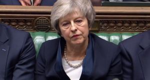  Theresa May reacts as Labour Party leader Jeremy Corbyn informs the MPs that he has tabled a vote of no confidence in the Government in the House of Commons on Tuesday. Photograph: Ho/Pru/AFP/Getty Images 