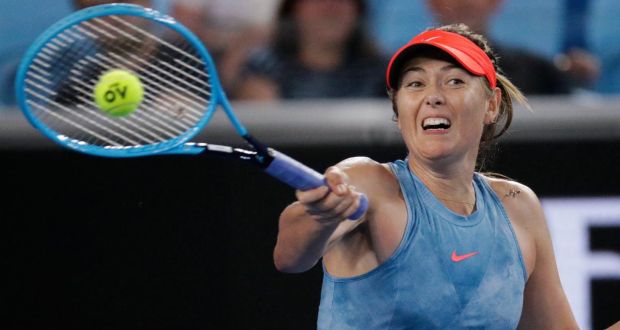  Maria Sharapova makes a forehand return to Sweden’s Rebecca Peterson during their second round match at the Australian Open in Melbourne, Australia. Photograph: Aaron Favila/AP 