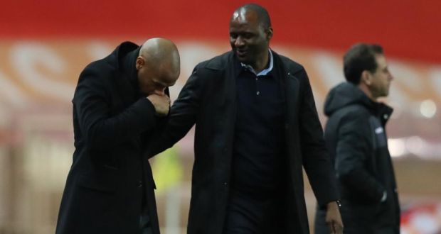 Monaco’s  coach Thierry Henry and Nice’s  coach Patrick Vieira react at the end of the French Ligue 1 match between Monaco and Nice  at the Stade Louis II on Wednesday.Photograph: Valery Hache/AFP/Getty Images