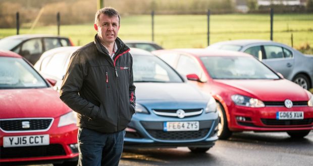 Kieran Whelton with some of his UK imported secondhand cars at his car dealership in Knock, Co Mayo. Photograph: Keith Heneghan