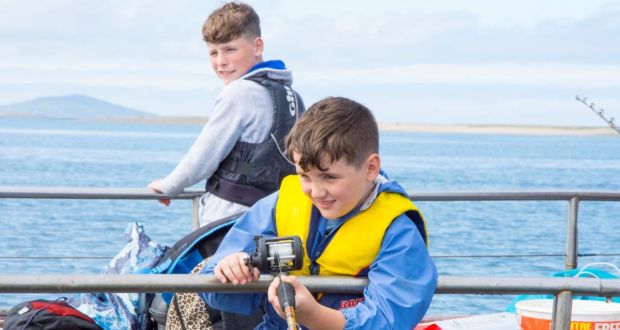 Matthew Moran and Oisin Fynes on a fishing trip with Newport Sea Angling Club